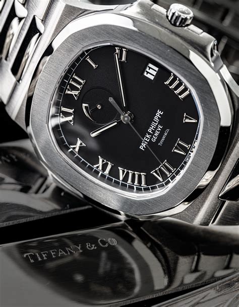 patek philippe nautilus datum sweep sekunden|PATEK PHILIPPE. A RARE STAINLESS STEEL AUTOMATIC .